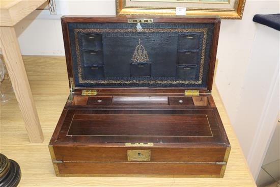 A Regency brass bound rosewood writing slope, with Thompsons Patent lock